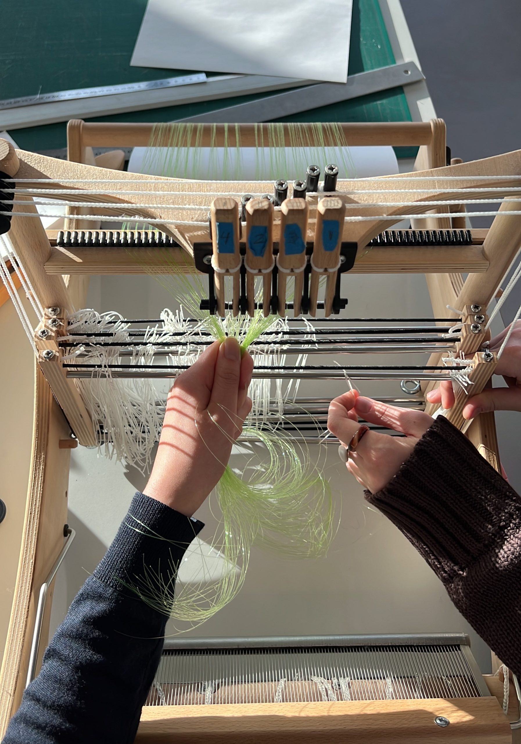 Warping the loom Warping the loom