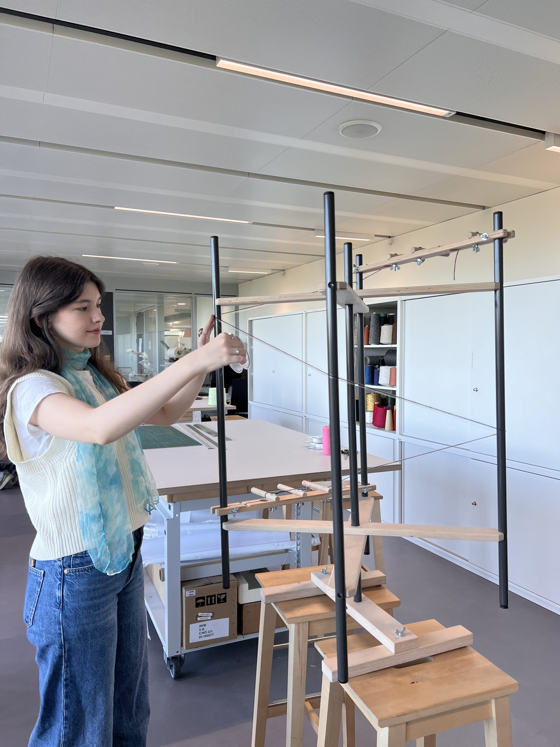Warping the loom Warping the loom